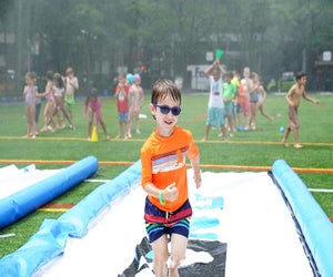 Asphalt Green's Sprinkler Day is wet-and-wild fun for the whole family. Photo courtesy of Asphalt Green