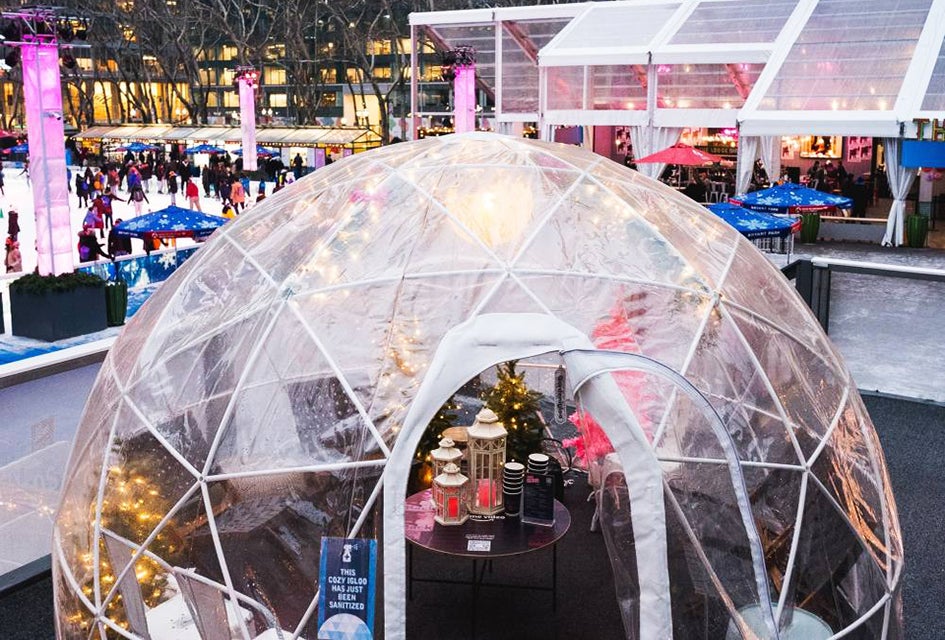 Revel with the family in your own private igloo at Bryant Park's Winter Village. Photo by Kevin Ornelas 