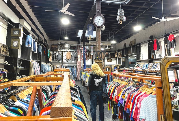 Thrift stores in NYC: Racks of clothes