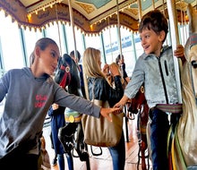 Jane's Carousel celebrates its 14th year in Brooklyn with free rides and face painting on Saturday, May 3, 2025. Photo by Sara M.