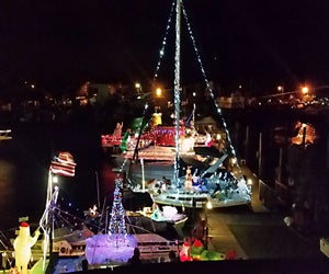 See boats decked out in holiday lights at the Patchogue Boat Parade. Photo courtesy of the parade organizers