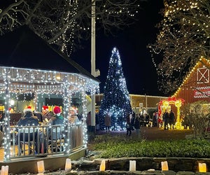 Find a magical spot for your pictures with Santa Claus in 2024. Photo courtesy of Olde Mystick Village