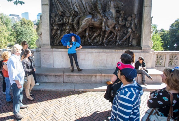 Photo of tour in front of the Massachusetts 54th memorial in Boston.