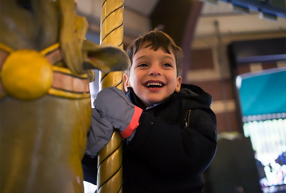 Even if it's still chilly you can celebrate spring with a ride or two on the beautiful carousel in the heart of Brooklyn's Prospect Park! Photo by Mommy Poppins 