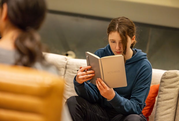 Image of woman with book at Miraval Berkshires