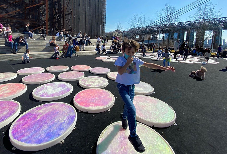 Even in the bright sunlight, Reflect, in Domino Park is a sight to behold. Photo by Sara M.