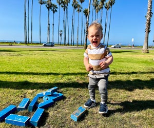 Play lawn games at the Hilton Santa Barbara while looking at the ocean and palm trees. Photo Courtesy of Gina Ragland