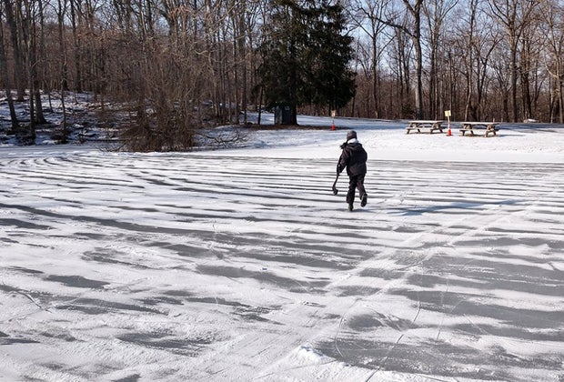 Free things to do in Westchester and the Hudson Valley: Hockey player skates on the free Sal J. Prezioso Mountain Lakes Park pond