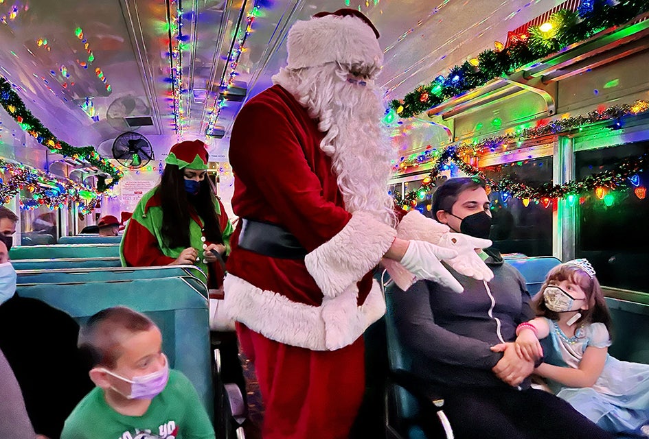 Twinkling lights, jolly old St. Nick, and plenty of sweet treats await during a ride on The Polar Express Christmas train.