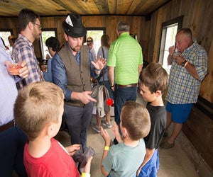 Up close to see the magician's magic trick. Photo courtesy of Savor Litchfield 