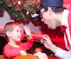 Say hi to the conductor before meeting Santa on the Southern California Polar Express Train Ride. Photo courtesy of the train