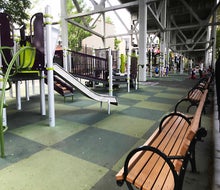 St. Mary's Park in Carroll Gardens is tucked in the shade beneath train tracks. Photo by Jeffrey Locke
