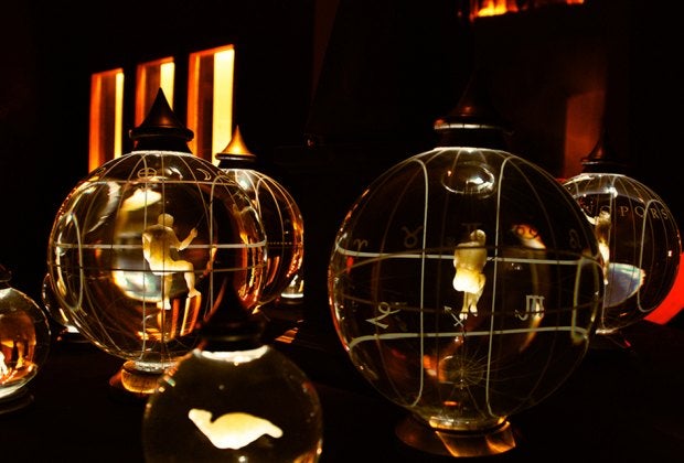 The divination table from the exhibit The World Is Bound with Secret Knots