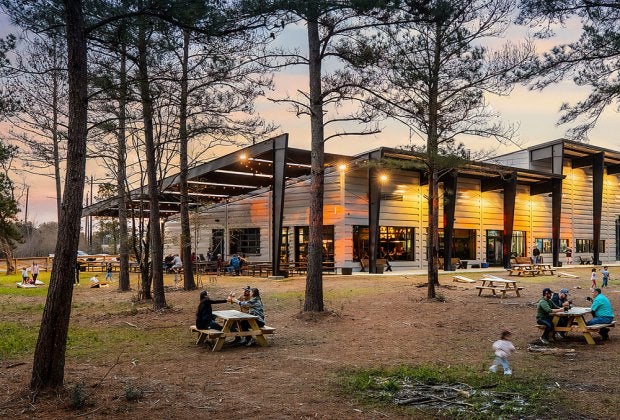 Families enjoying a night out. Photo courtesy of Paradigm Brewing in Tomball