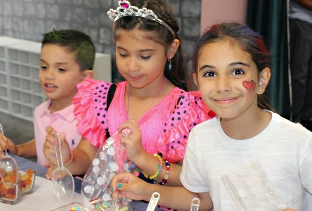 Little girls will be all smiles at a birthday party at As You Wish.