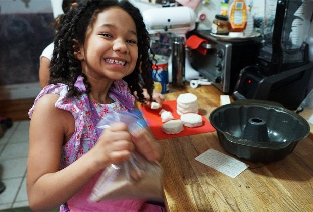 Put kids to work in the kitchen baking  family-favroite treats! Photo by Jody Mercier