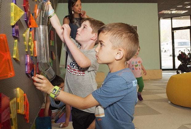 Kids can't get enough of Genius Gems' magnetic interactive light wall.