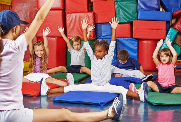Little ones can stretch, tumble, roll, and learn real gymnastics skills at a variety of gyms on Long Island. Photo by Robert Kneschke via Canva.com