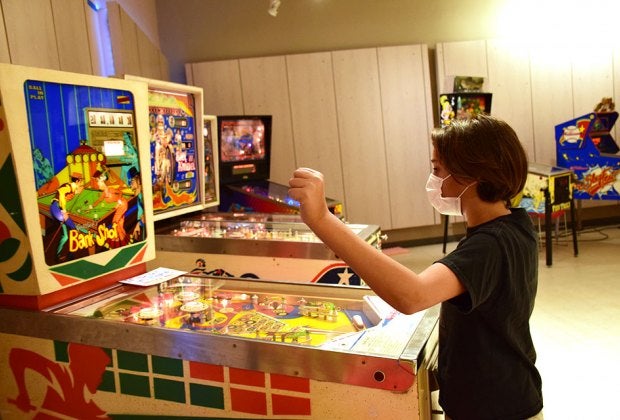 Rows and rows of pinball machines await at the newly opened High Score Pinball in the Westfield South Shore Mall.