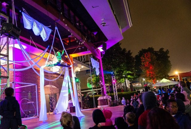 Kick off Halloween at Duluth's Howl on the Green featuring food, music, and live entertainment, including fire dancers and aerialists! Photo courtesy of City of Duluth
