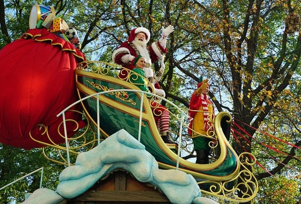 Santa rolls into town at the tail end of the Macy's Thanksgiving Day Parade and starts taking gift requests at Santaland on Friday. Photo by Jody Mercier