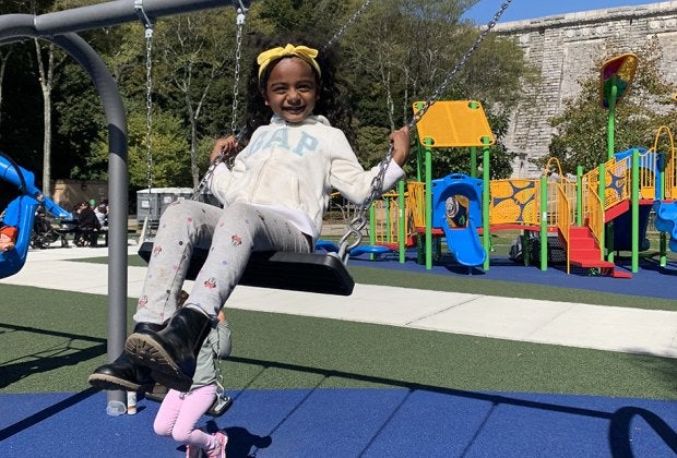 Enjoy a ride on one of the many swing sets.