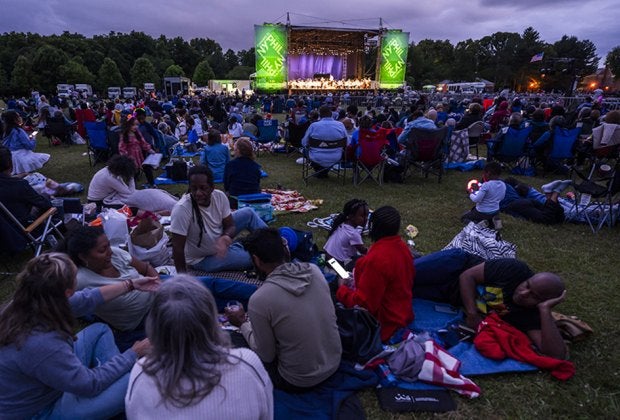 Bring a picnic to the New York Philharmonic's annual free concerts across New York City with post-concert fireworks. Photo Van Cortlandt Park/Chris Lee