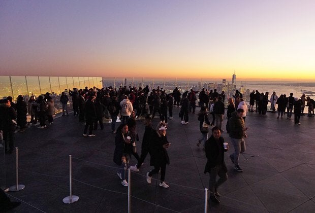 See the sunset from the suspended observation deck at the Edge for a memorable after-dark outing. Photo by Jody Mercier