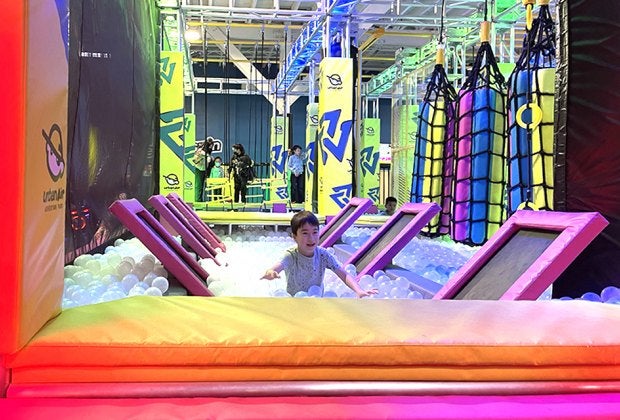 Urban Air Adventure Park is much more than a typical trampoline park, with ropes courses, climbers, VR, and more. Photo by Diana Kim