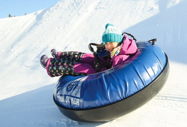 Snow tubing adventures in NorCal are at the ready for kids of all ages. Photo by Trevor Clark, courtesy of Tahoe Donner
