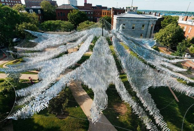 Inspired by the movements of schools of fish, this outdoor sculpture moves with the seaside winds in New Bedford. Photo courtesy of Poetic Kinetics