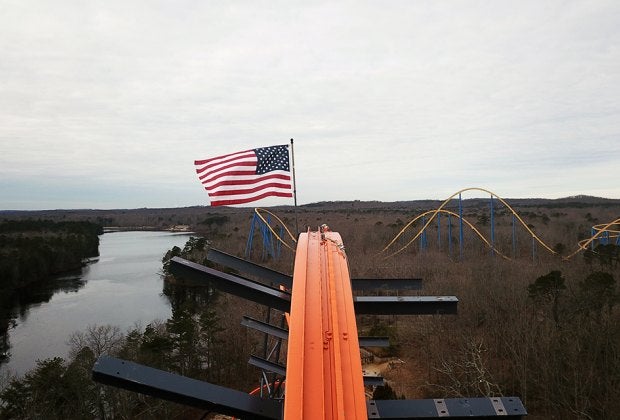 Towering 13 stories tall, Jersey Devil Coaster riders soar single file at speeds of up to 58 mph.