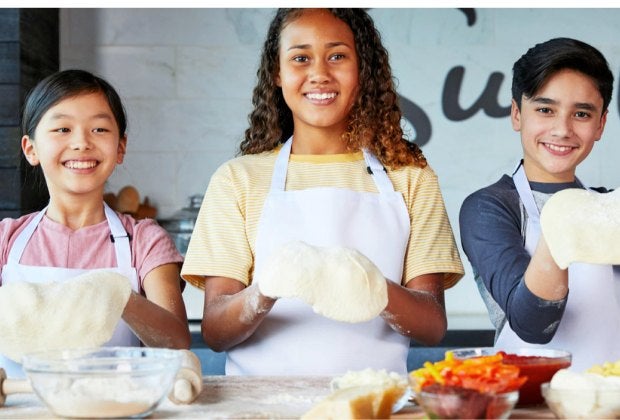 Kids are encouraged to explore world cuisines (that includes pizza!) at Sur La Table. Photo courtesy of Sur La Table 