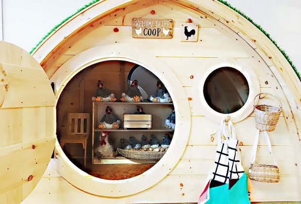 Check out the adorable chicken coop and collect some eggs.