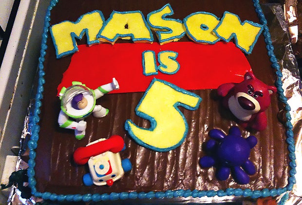 Birthday Cake Ideas for a Kids' Birthday Party: Toys on top double as decoration and an additional gift