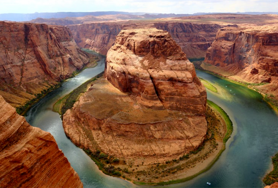 Take in the jaw-dropping geological views from Horseshoe Bend in Glen Canyon National Recreation Area. Photo courtesy of Canva