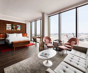 The TWA Hotel isn't far from home, but offers a little mid-century glam and some unique views. 