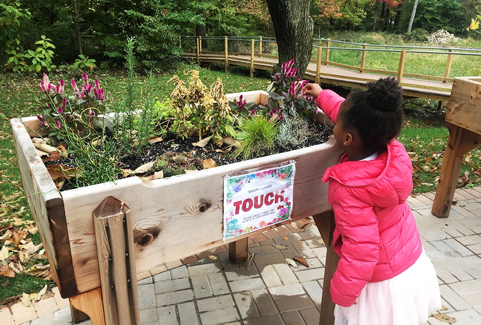 Kids are encouraged to get hands-on on the trail.