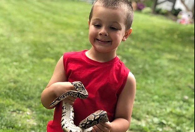 Two by Two Animal Haven animal birthday party boy with snake