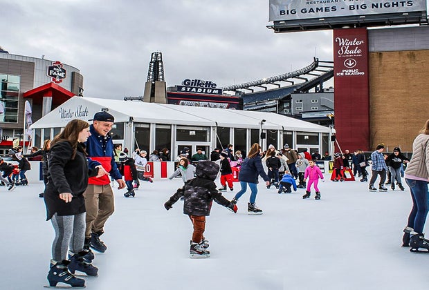 Image of people skating at Patriot Place - best outdoor skating rinks in Boston.